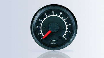 Quando o bourdon é submetido àpressão, ele tende a se expandir, aumentando o seu raio de curvatura.