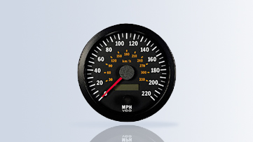 Indica a velocidade do veículo por meio de um ponteiro e as distâncias parcial e total.